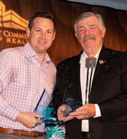 Bill Eshenbaugh and Ryan Sampson accepting FGCAR Land Deal of the Year Award