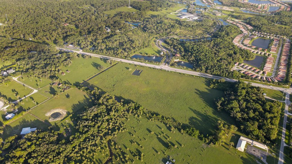 Florida land with road frontage and nearby development