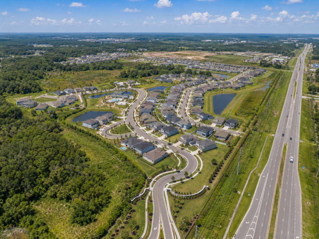Residential subdivision in Pasco County, Florida, where impact fees affect developer land pricing.