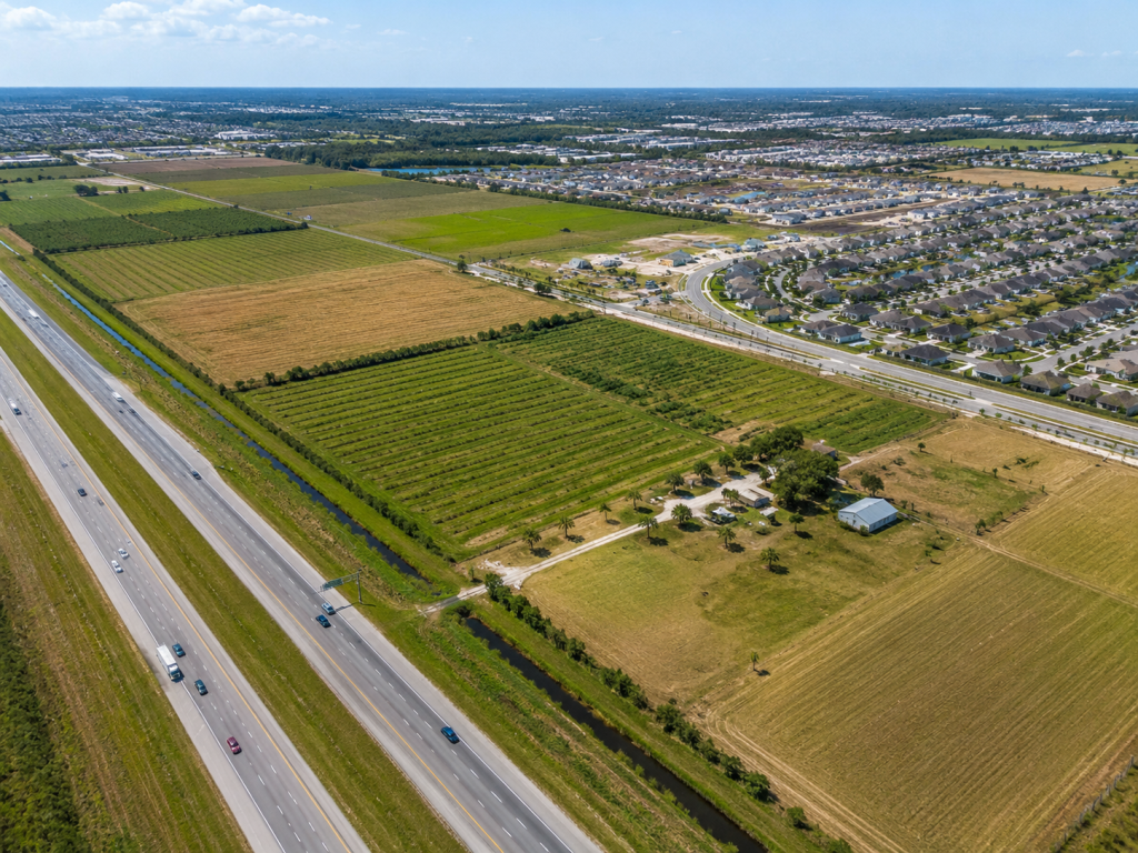 Florida agricultural land surrounded by existing development, potentially qualifying as an agricultural enclave under SB 686